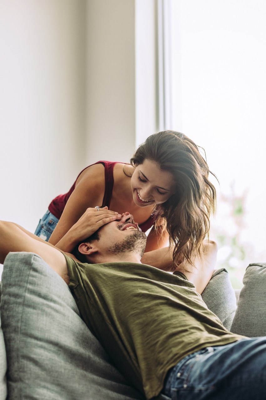 Smiling Female Surprising Her Boyfriend