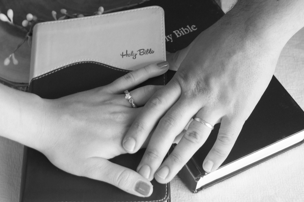 Couple's Hands Symbolizing Christian Marriage/ Black and White